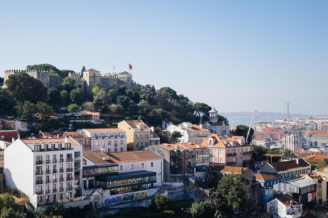 Lisbon E-Bike Tour Commerce Square, Mouraria and Alfama - São Vicente de Fora: Monastery Power and Rooftop Tagus Views