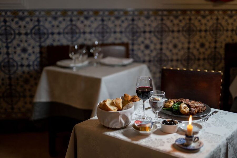 Lisbon: Fado Show and Portuguese Dinner - Inside a traditional Fado house in Bairro Alto: intimacy, not a concert hall