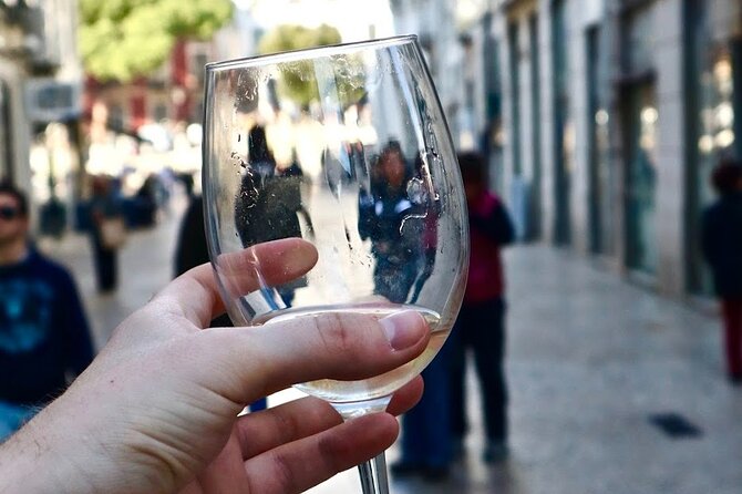 Lisbon Food Tour with 10+ Tastings of Local Delicacies & Wines - Mouraria and Alfama Stops: Cheese, Cured Meat, Sardines, and Petiscos in Real Places