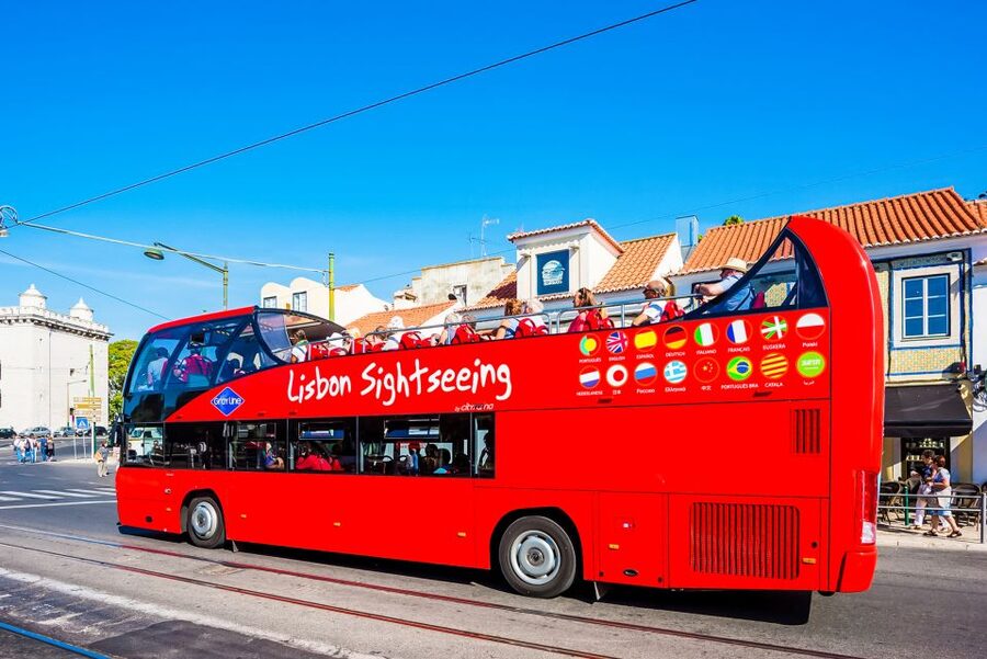 Lisbon: Hop-On Hop-Off Bus Tour - Castle Line through Alfama streets: where Fado energy lives, plus the single-decker note