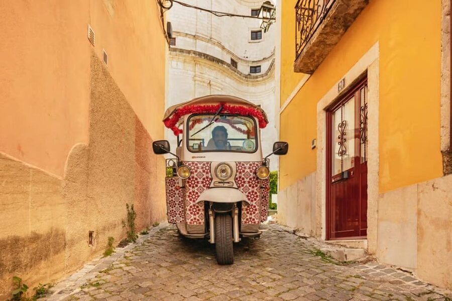 Lisbon: Private Guided Tuk-Tuk Tour with Hotel Pickup - Chiado and Bairro Alto: fado-era atmosphere with hill-proof logistics