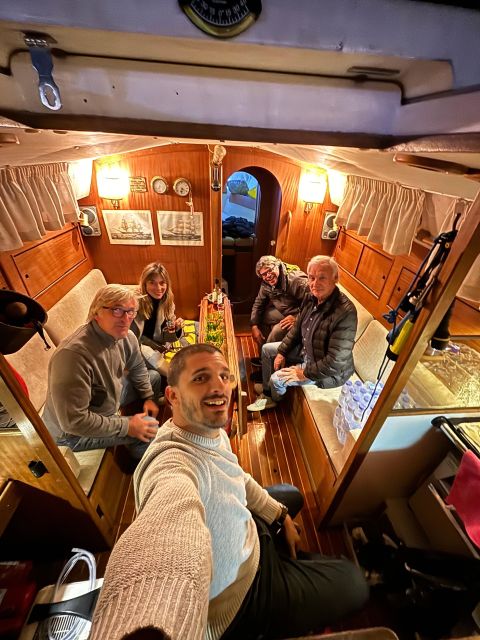 Lisbon: Private Sailing City & Sunset Tour - Under the 25 de Abril Bridge: where the river view turns into context