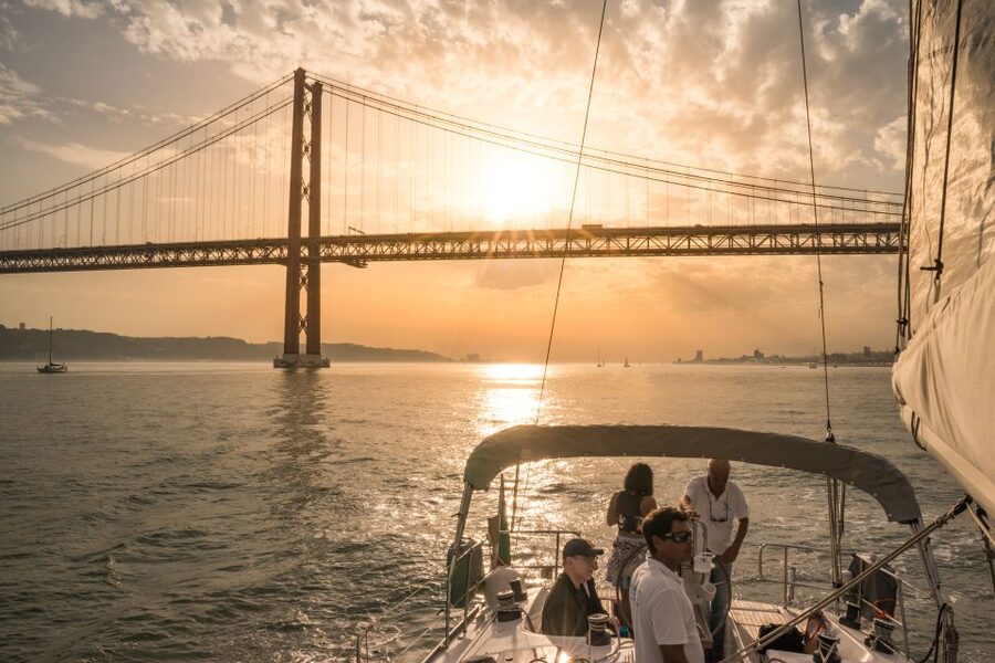 Lisbon: Private Sunset Cruise on the Tagus River with Drink - Praça do Comércio and the Basilica da Estrela dome, seen from the river