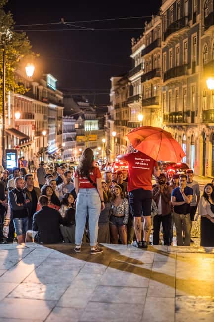 Lisbon: Pub Crawl with Open Bar (Premium Upgrade Available) - Bairro Alto First Bar: One Hour of Unlimited Beer and Sangria