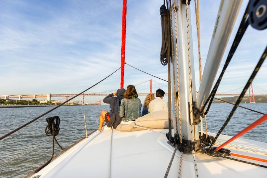 Lisbon: Sailing Tour on the Tagus River - Outbound highlights: Monument of Discoveries under 25 de Abril Bridge