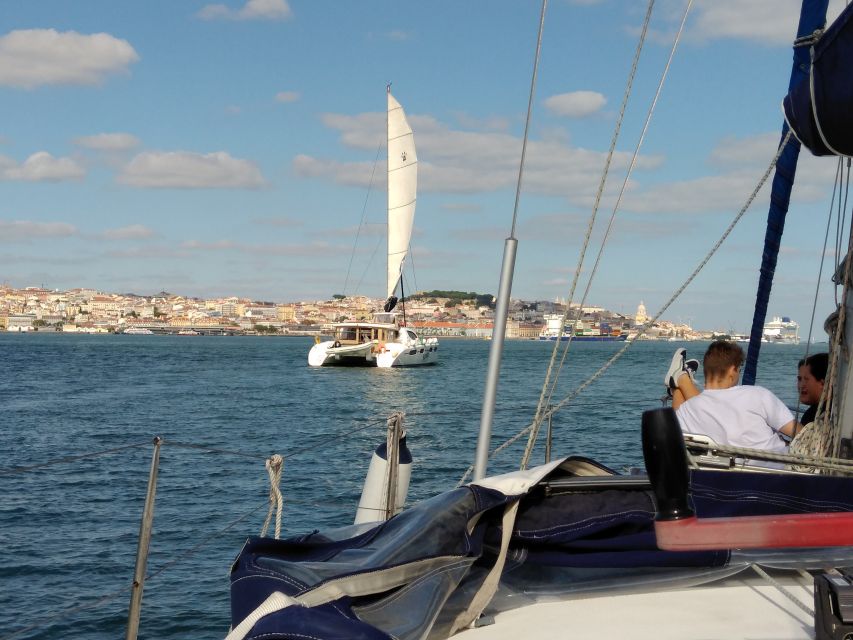 Lisbon: Sailing Tour with Wine and Snacks - Alfama from the water: spotting the neighborhood’s river personality
