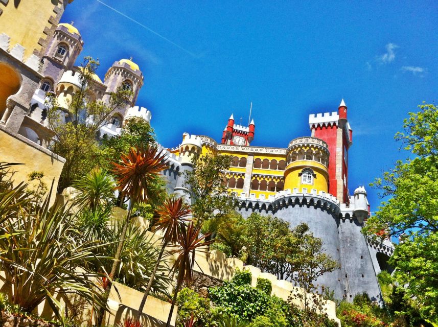 Lisbon: Sintra & Pena Palace Half-Day Tour with Hotel Pickup - Guincho Beach and Cascais Bay, where the coast stays scenic and manageable