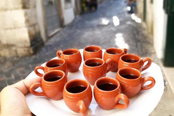 Lisbon Small-Group Food Tour with 18 Tastings in Alfama District - Miradouro de Santo Estêvão: The Quiet Break and the Good Photo Moment