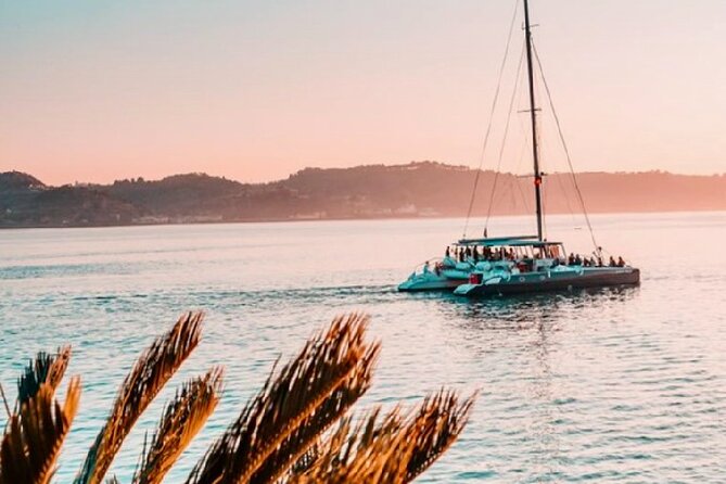 Lisbon: Sunset Catamaran Boat Tour with Music and Drinks - Why this Lisbon sunset cruise feels different from a walking tour