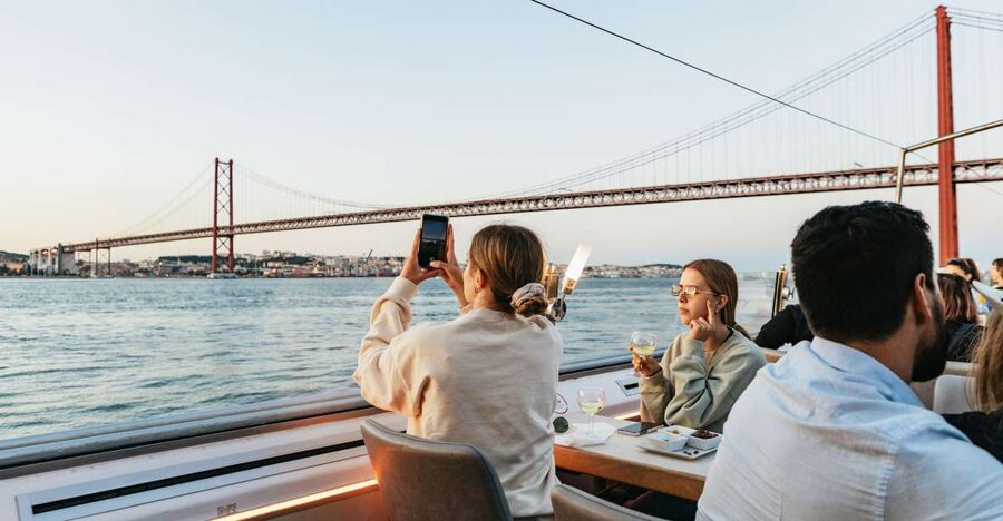 Lisbon: Sunset Cruise with Welcome Drink and Snacks - A 1.5-hour Tagus sunset show under the 25 de Abril Bridge