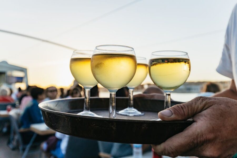 Lisbon: Sunset Cruise with Welcome Drink and Snacks - Onboard audio guide in multiple languages, and why your phone matters