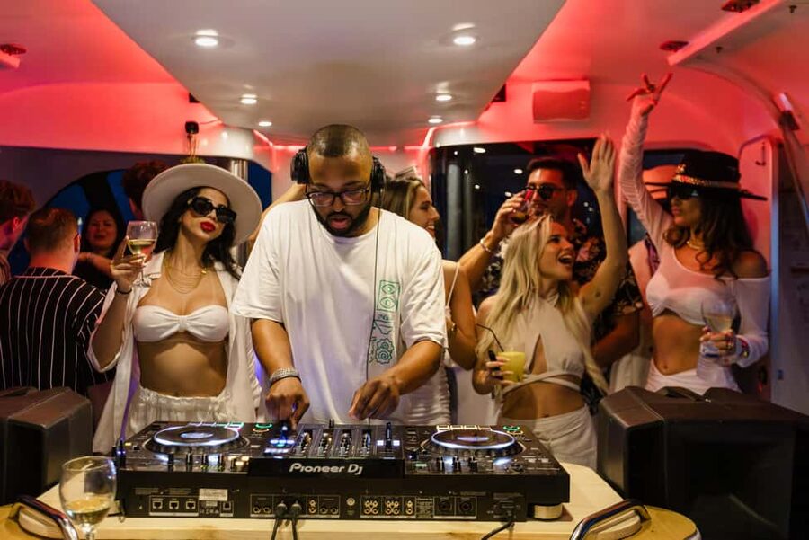 Lisbon: Sunset DJ & Porto Tonic Premium Boat Experience - Crowd and energy: fun, but not for everyone