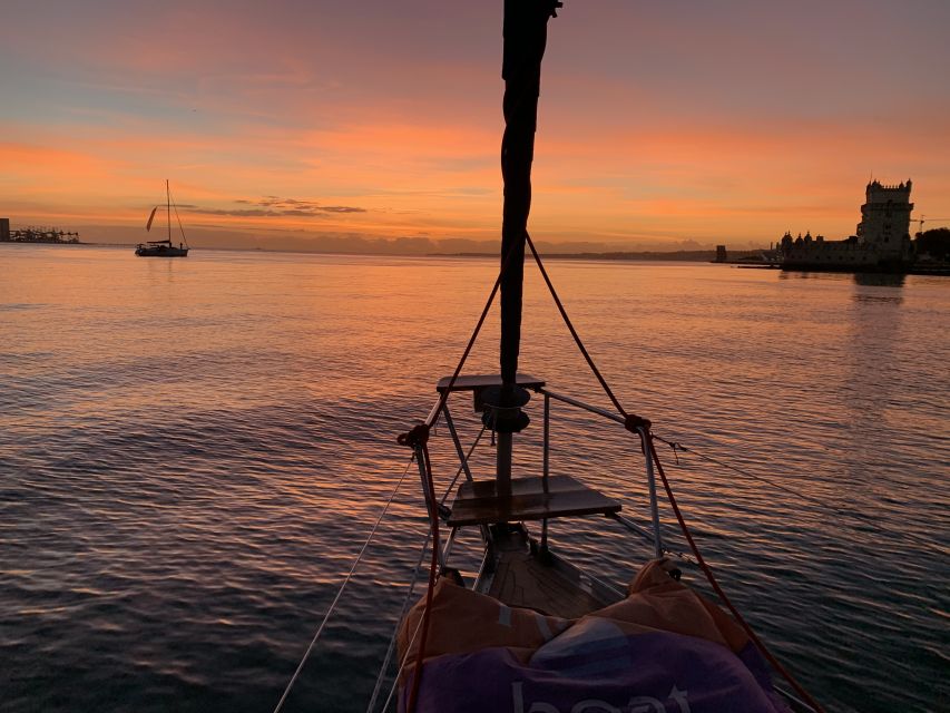Lisbon: Sunset Sailing Cruise with Wine - Getting on Board: Time, Warm Layers, and the Alcohol Rules