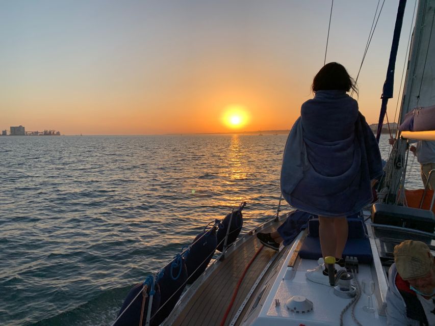 Lisbon: Sunset Sailing Cruise with Wine - Green Wine, Small Snacks, Blankets, and the Cruise Pace