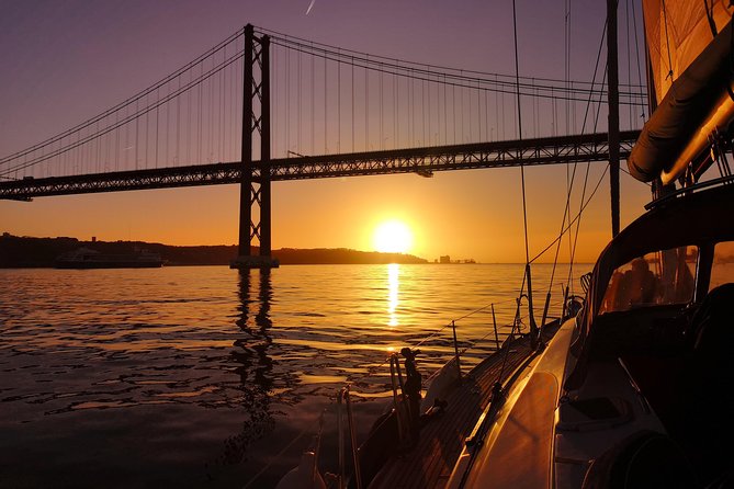 Lisbon Sunset Sailing Tour on Luxury Sailing Yacht with 2 Drinks - The drink and appetizer moment: the easiest way to enjoy sunset