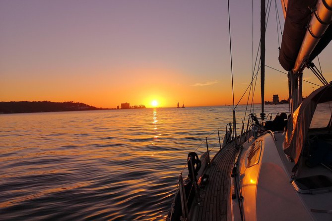 Lisbon Sunset Sailing Tour on Luxury Sailing Yacht with 2 Drinks - Crew of two: how the commentary makes the cruise feel personal