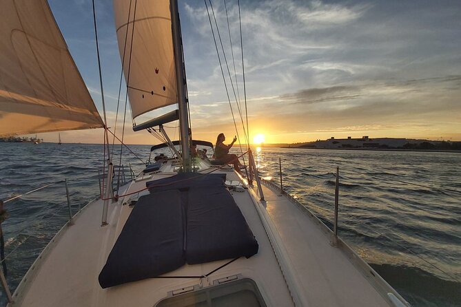 Lisbon: Sunset Sailing with Portuguese Wine and History - The 12-meter sailboat experience, and what “at home” feels like