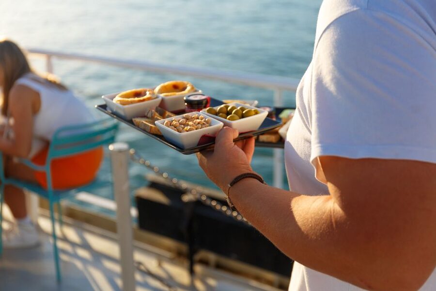 Lisbon: Tagus River Sunset Tour with Snacks and Drink - Weather, clothing, and the comfort math for the top deck