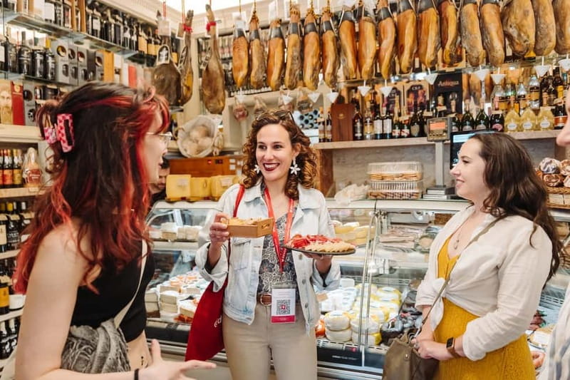 Lisbon: Tastes and Traditions Guided Food Tour - Local Grocery Counter Crunch and Iberian Ham Sampling
