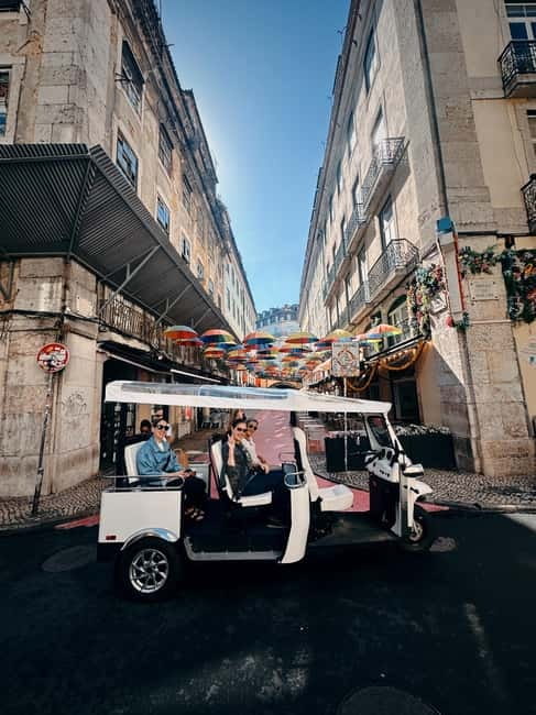 Lisbon with Tukxi: From East to West Private Tour by Tuk Tuk - Baixa, Rossio, and Santa Justa: the city center you can actually understand after the hills
