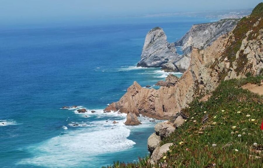 Magical Day Trip: Pena Palace, Sintra, CaboDa Roca & Cascais - Quinta da Regaleira and Monserrate: symbolic gardens and architectural mix
