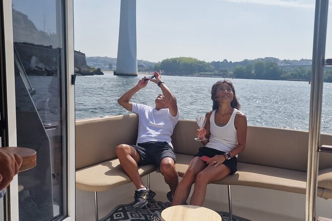 Port : 6 Bridges Cruise , Douro River with Sunset Option - Getting Comfortable on Board: Three Areas, Rain Protection, and the Calm Vibe