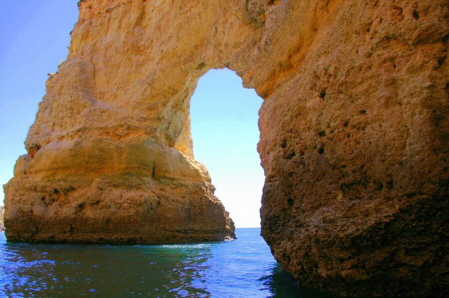 Portimão: Pirate Ship Cave Cruise - Inside the caves: wooden dingis and real tight-space time