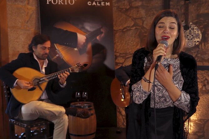 Porto: Cálem Cellar Tour, Live Fado Show and Wine Tasting - The live Fado show in the caves: male and female voices, guitar, and atmosphere