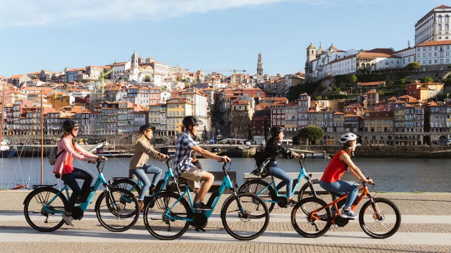 Porto: City Highlights 3-Hour Guided Electric Bike Tour - Livraria Lello and Clérigos Tower, pass-by stops that still help