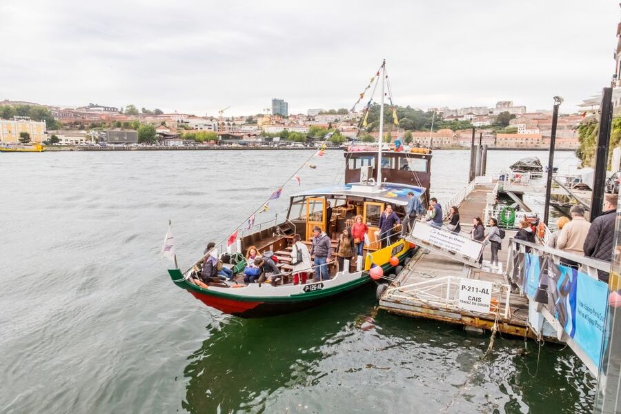 Porto: City Train Tour, River Cruise & Wine Cellar - Ribeira Pier Douro cruise: bridge views, no headset, and how to avoid dock confusion