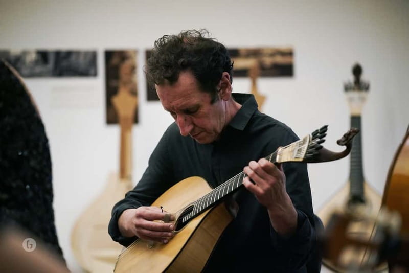 Porto: Fado & Port Wine in Traditional Portuguese Music Shop - Journey through String Instruments: seeing Portuguese guitars, mandolins, and viola up close