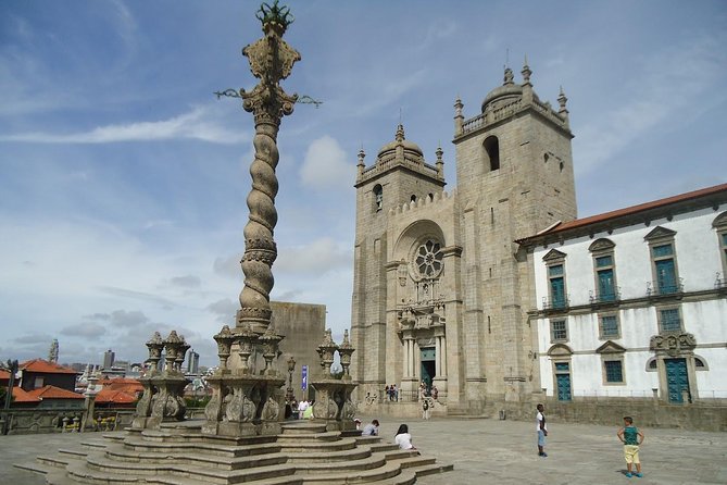 Porto Full Day City Tour Wine Tasting and Six Bridges Cruise - Old Town Walking Tour: UNESCO Streets and Medieval Feel