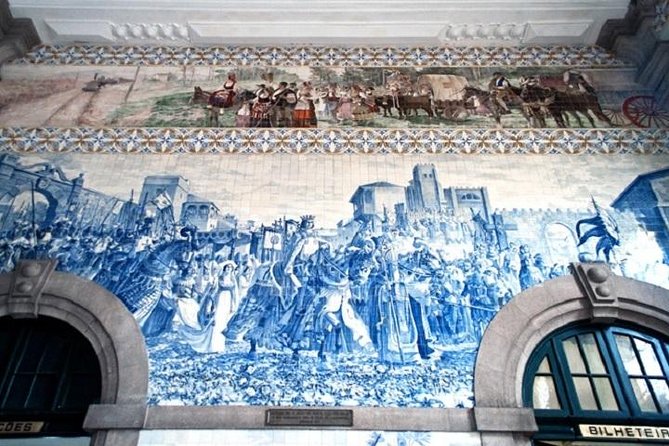 Porto Full Day City Tour Wine Tasting and Six Bridges Cruise - Clérigos Church and the Baroque Staircase Vibe