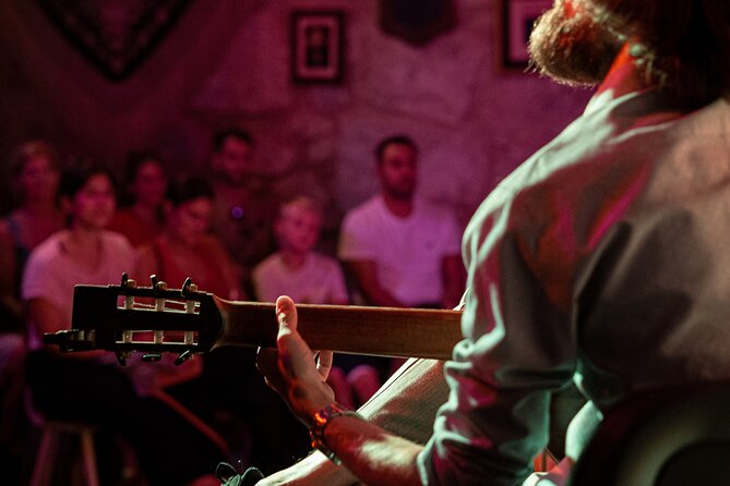 Porto: Live Portuguese Fado Experience with Port Wine - Fado na Baixa: A close-up, licensed stage in Porto