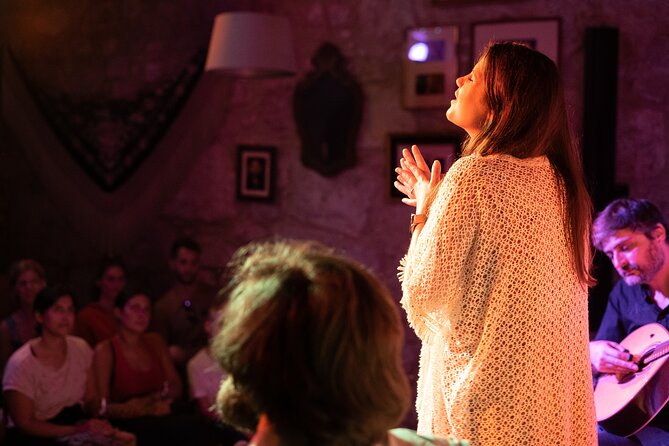 Porto: Live Portuguese Fado Experience with Port Wine - Language support, screen stories, and what to expect in your seat