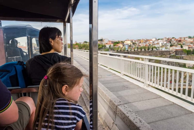 Porto: Magic Train Tour and Port Wine Cellar with Tastings - The tourist train loop: key monuments with real context