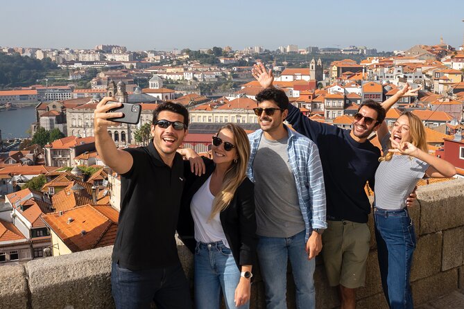 Porto Walking Tour, Lello Bookshop, River Cruise and Cable Car - Walking through Porto, from São Bento Station to the Ribeira edge