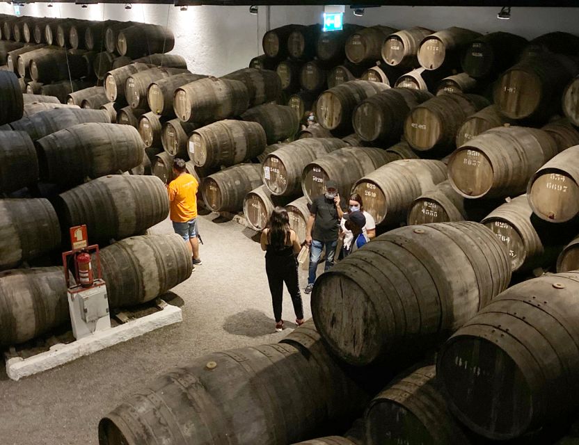 Porto: Wine Tasting with Tapas Walking Tour - The winery stop: where you learn production and taste Port