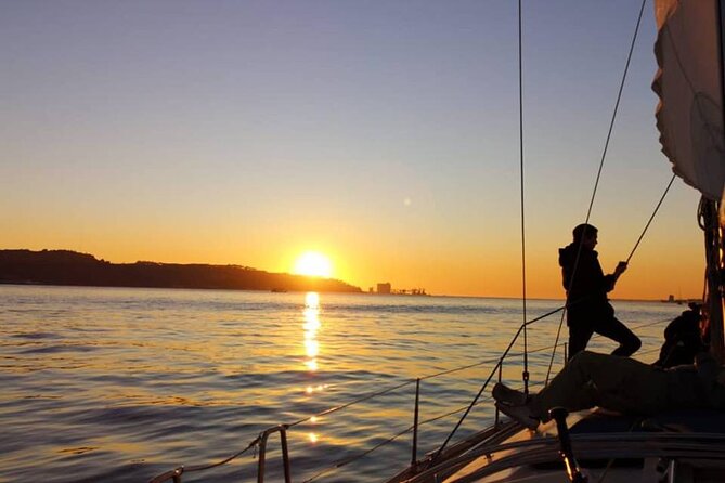 Sailboat Tour in Lisbon with drinks included | Morning and Sunset - Cristo Rei: the promise, the Sacred Heart, and the Rio connection