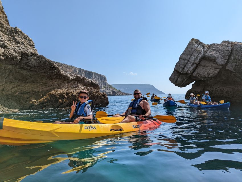 Sesimbra: Arrabida Natural Park & Caves Guided Kayaking Tour - Ribeiro do Cavalo Beach Break: Swim, Photos, and Traditional Sweets