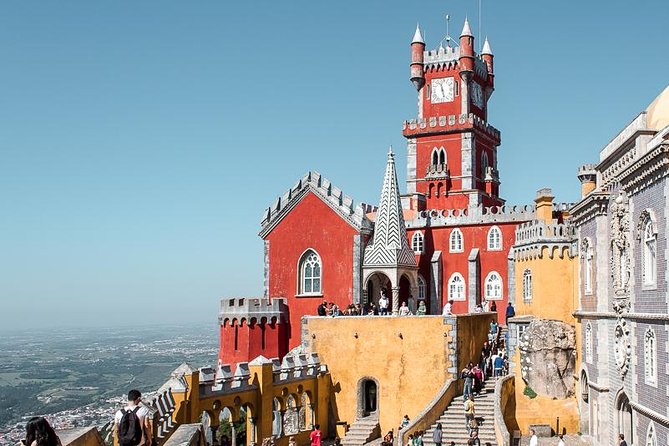 Sintra & Cascais Day Tour with Pena Palace Entry and Gardens Walk - Sintra Village free time: where to eat, shop, and reset