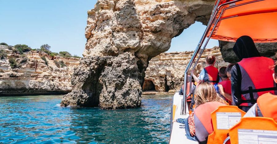 Vilamoura: Benagil Cave Boat Tour with Entry&Dolphin search - Boarding at Vilamoura Marina, what the first hour actually looks like