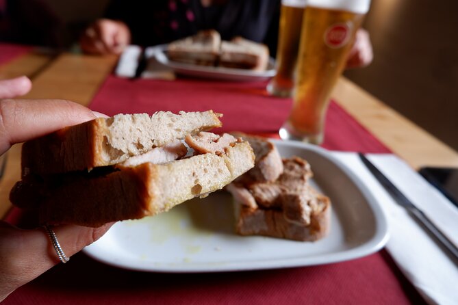 Winner 2025 Undiscovered Lisbon Food & Wine Tour by Eating Europe - Mouraria’s Narrow Streets and Camilla Watson Murals